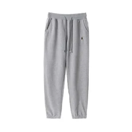 BAPE Embroidery Gray Heather Fleece Casual Pant, a versatile and comfortable addition to your casual wardrobe. Crafted by the renowned streetwear brand A Bathing Ape