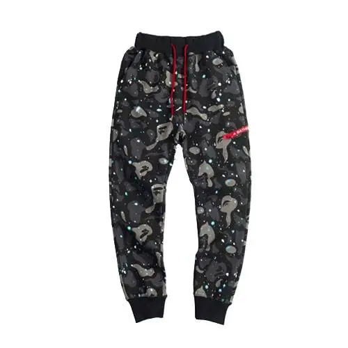 Bape Luminous Star Space Camo Pant, an extraordinary piece that combines the iconic Bape aesthetic with a futuristic twist.